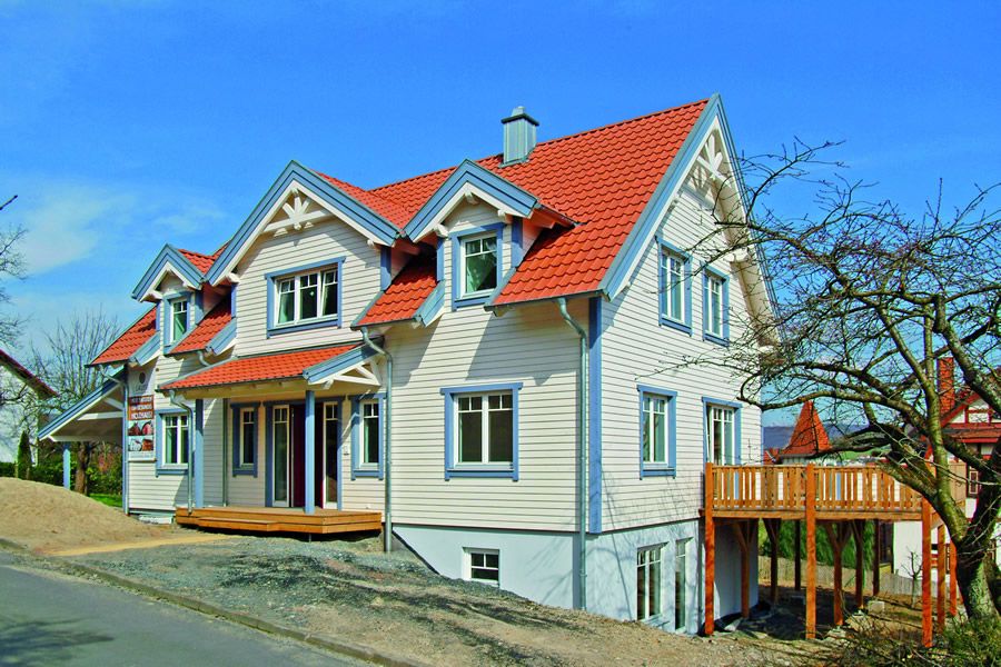 Einfamilienhaus nordischer Stil mit Holzverkleidung